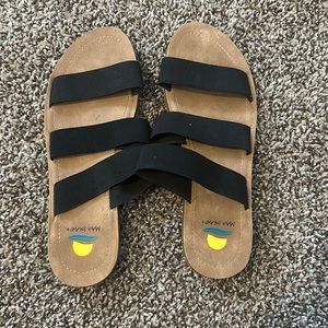 Black and tan strappy sandals